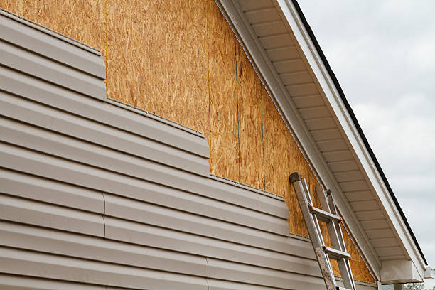 Professional Siding technician working in Norristown, PA